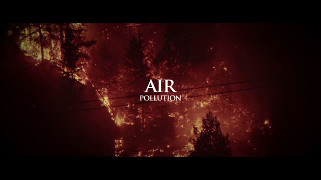 Forest fire, with the title &ldquo;Air pollution&rdquo;